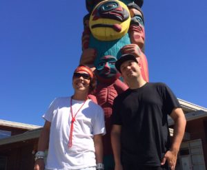 Tyler Jacobs and Bretten Hannam outside the Tsleil-Waututh Nation Community Centre